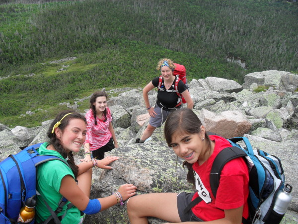 rock climbing with friends at camp outside