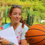 Landsports director teaching basketball at Camp Kippewa in Maine