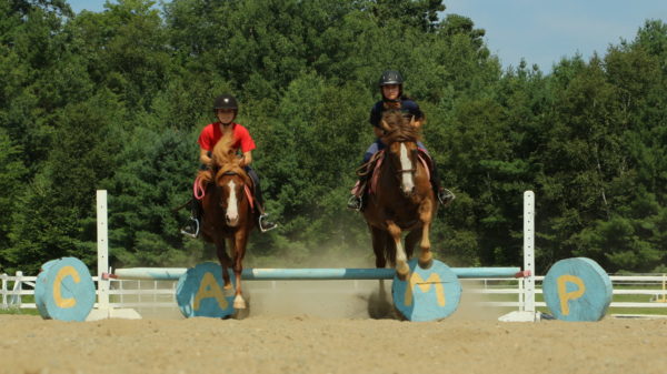 Horseback riding jumpers jumping all girls camp Maine at Kippewa Equestrian Academy