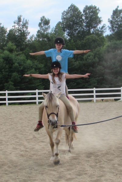 All girls horseback riding camp in Maine dressage jumpers equitation fun