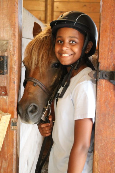 Girls who love horses learn at all girls horseback riding camp in Maine